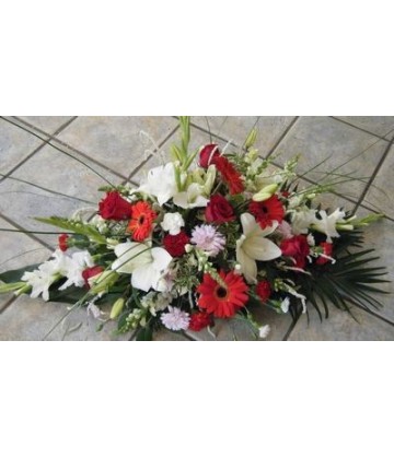Funeral arrangement in red and white    
